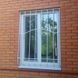 Решетка металлическая на окно, эскиз "Солнышко-1"