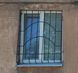 Решетка металлическая на окно, эскиз "Солнышко-2"